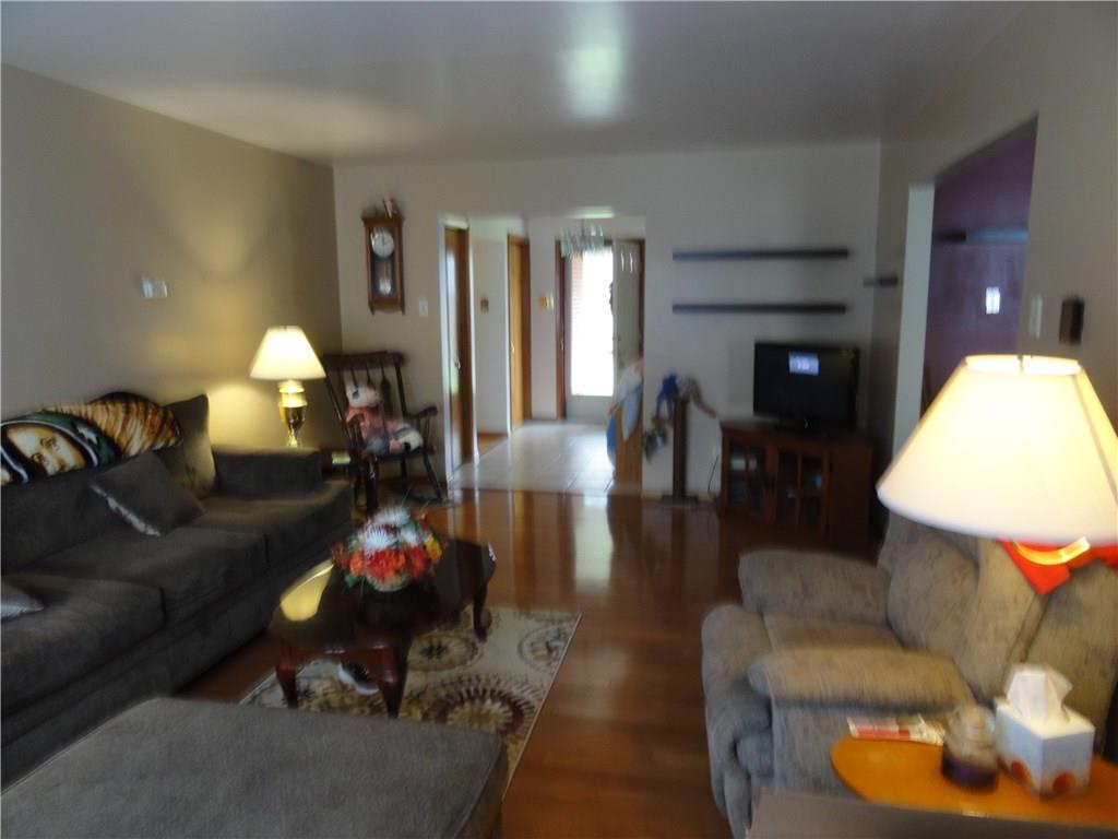 18 Beagle Club Road Washington, PA 15301 - Photo 4 of 25 Another photo of living room, looking toward the front entry.