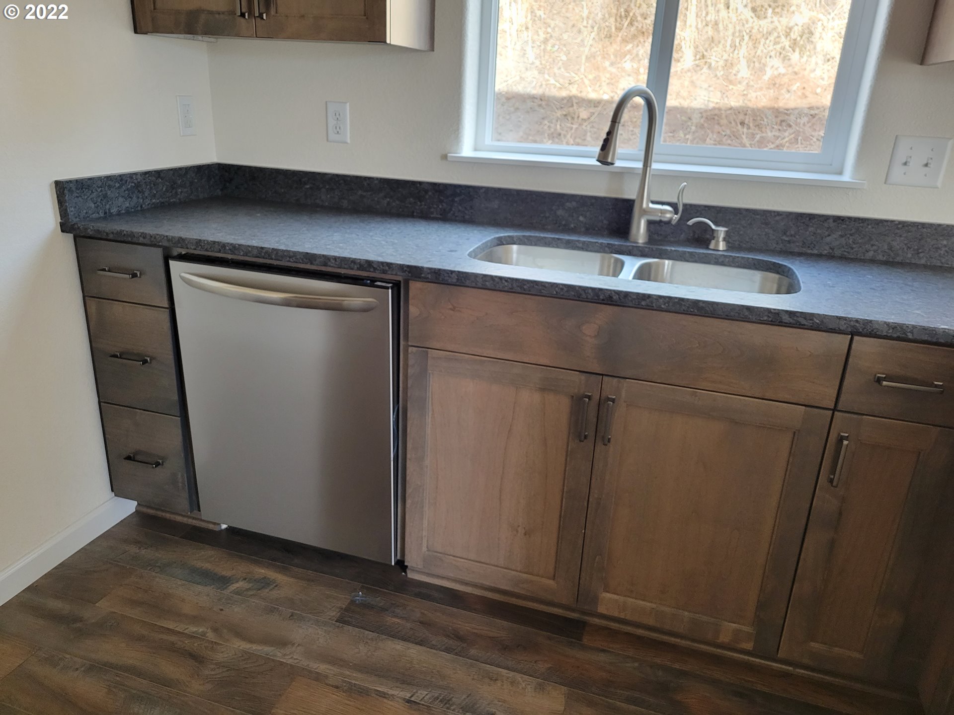 195 Armande Loop Roseburg, OR 97471 - Photo 15 of 28 a kitchen with a sink and a window
