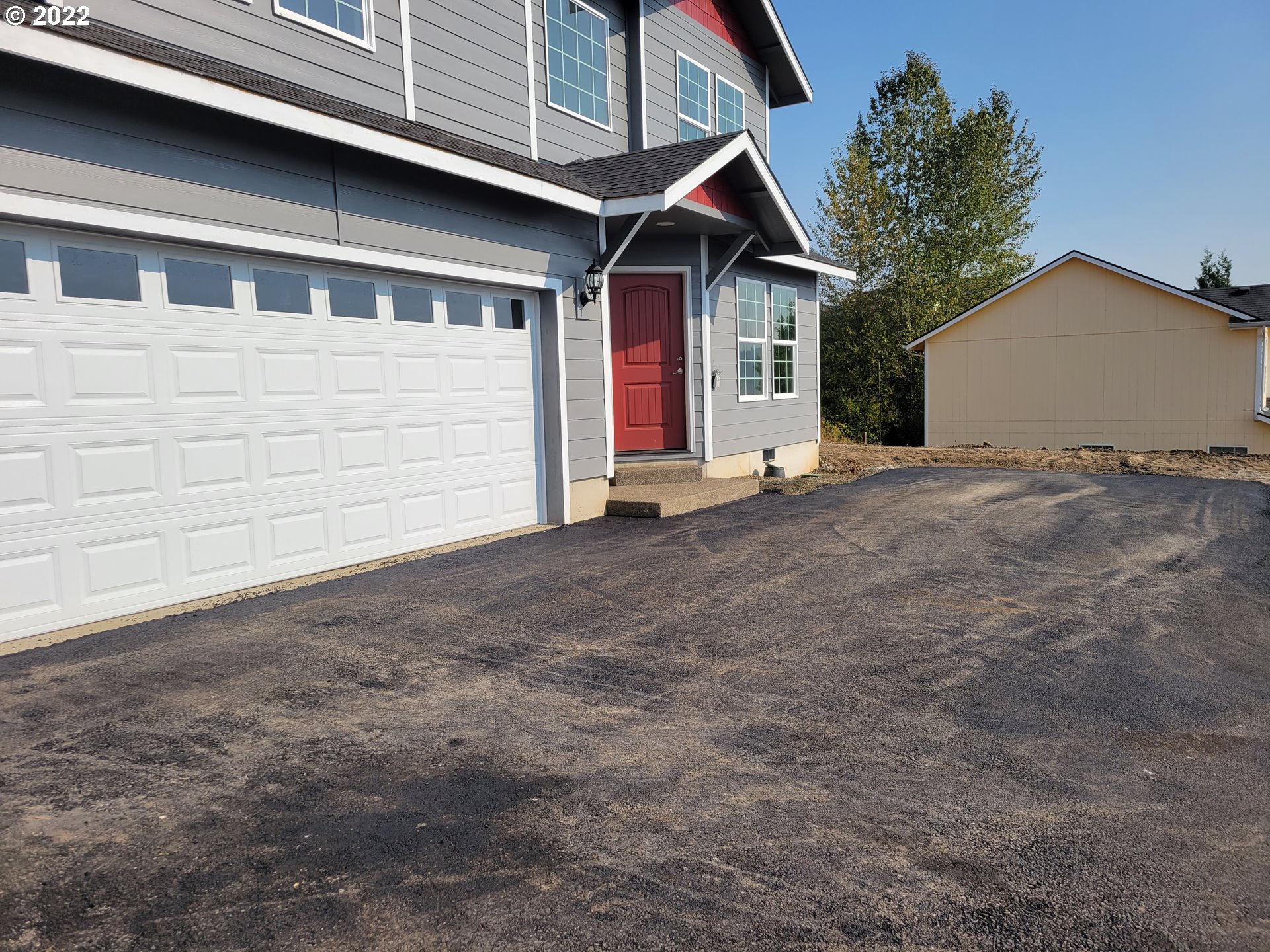 195 Armande Loop Roseburg, OR 97471 - Photo 2 of 28 a view of an house with backyard space and porch