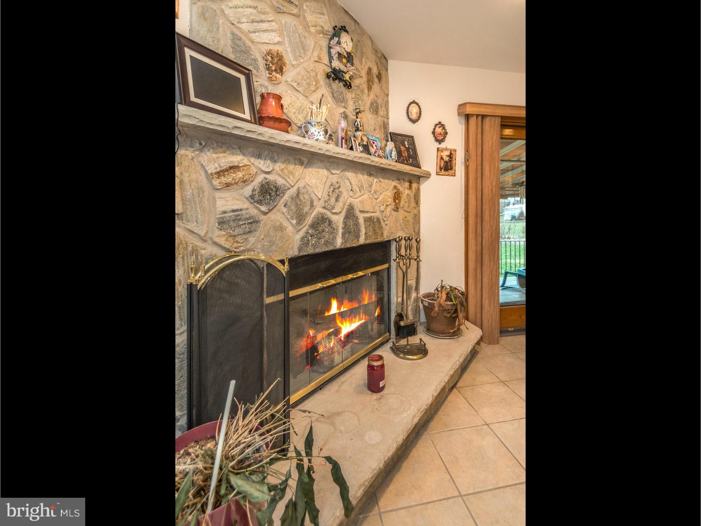 9818 Glenhope Road, Unit B Philadelphia, PA 19115 - Photo 10 of 25 Fireplace