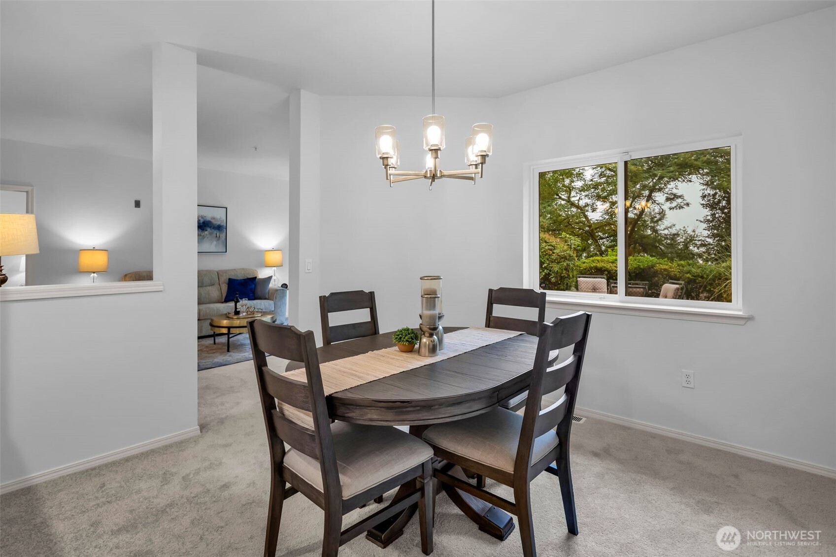 4212 221st Place Southeast, Unit 1561 Issaquah, WA 98029 - Photo 11 of 35 a view of a dining room with furniture window and outside view