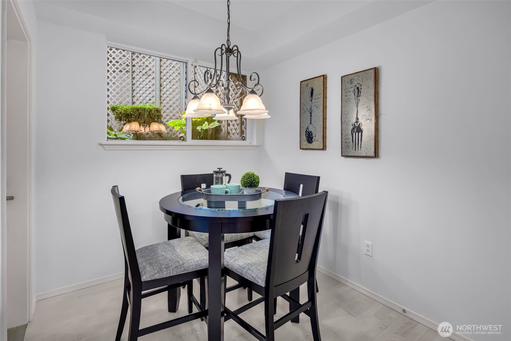 4212 221st Place Southeast, Unit 1561 Issaquah, WA 98029 - Photo 17 of 35 a dining room with furniture and chandelier