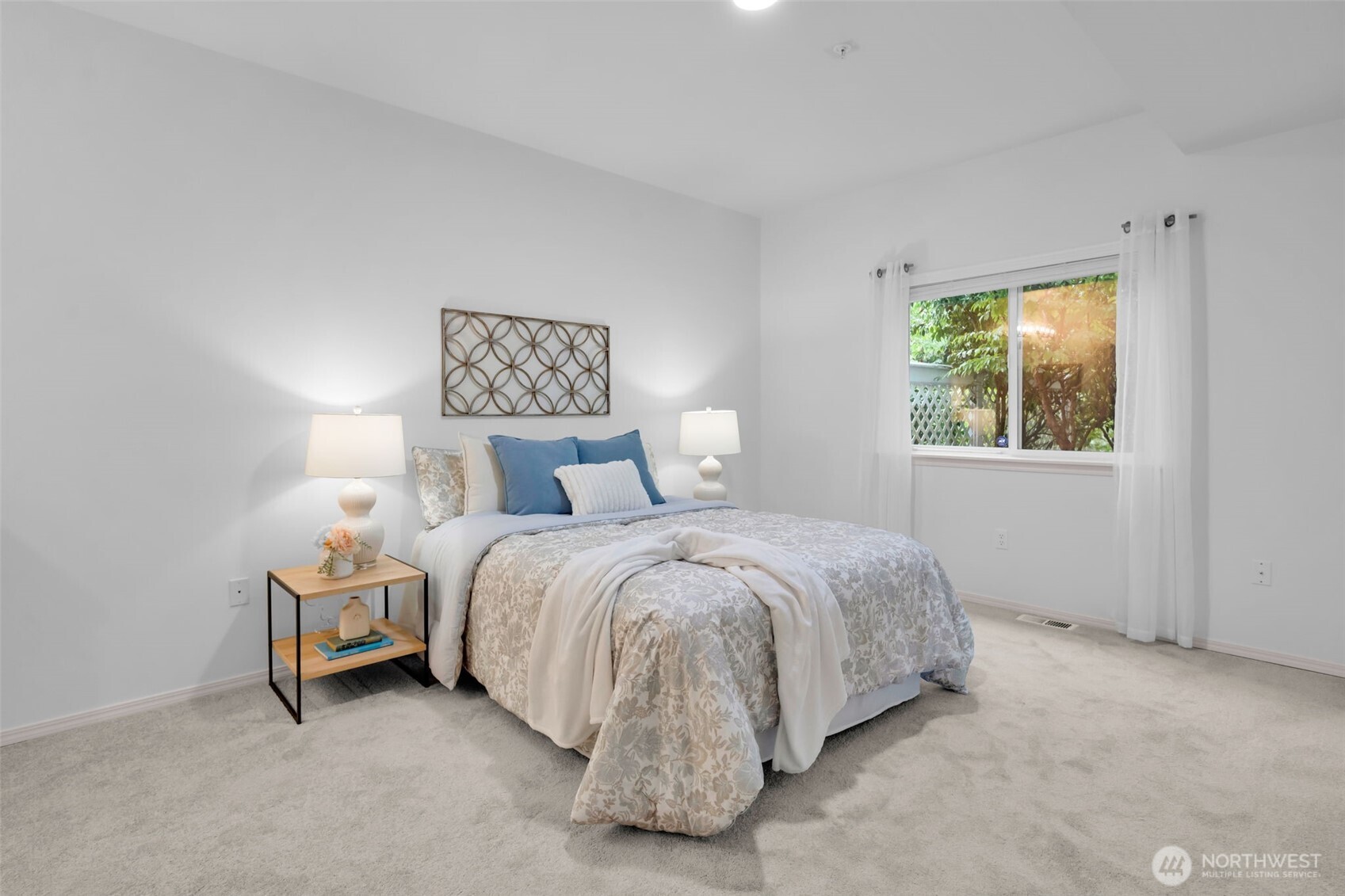 4212 221st Place Southeast, Unit 1561 Issaquah, WA 98029 - Photo 20 of 35 a spacious bedroom with a bed and a window