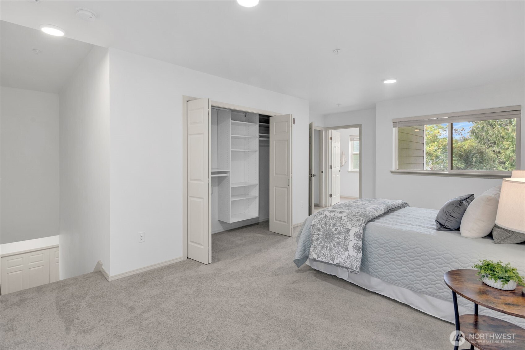 4212 221st Place Southeast, Unit 1561 Issaquah, WA 98029 - Photo 28 of 35 a bedroom with a bed and a couch