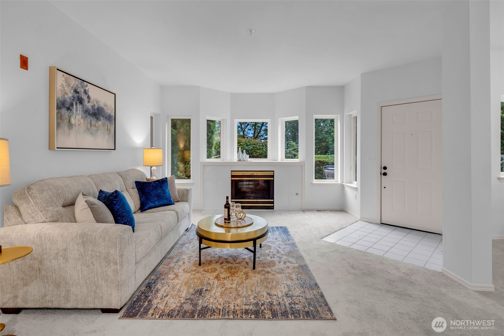 4212 221st Place Southeast, Unit 1561 Issaquah, WA 98029 - Photo 5 of 35 a living room with furniture and a fireplace