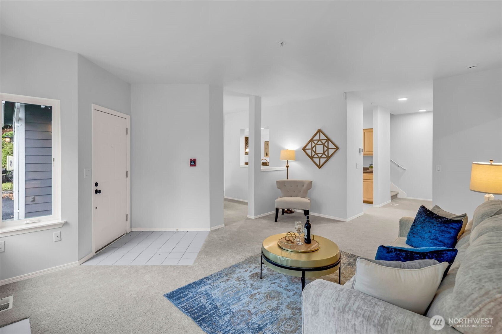 4212 221st Place Southeast, Unit 1561 Issaquah, WA 98029 - Photo 7 of 35 a living room with furniture and a rug