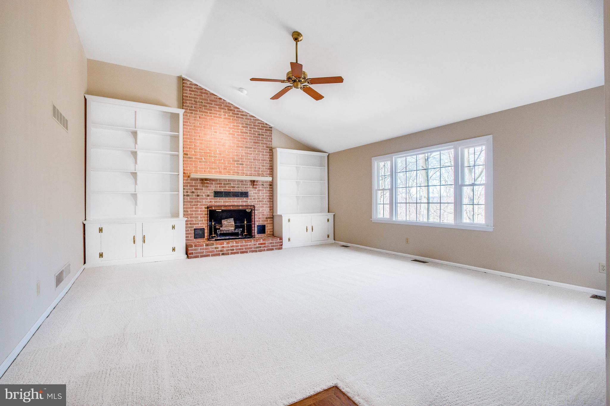 9 Radburn Lane Landenberg, PA 19350 - Photo 7 of 31 Family Room Fireplace with Built in Cabinetry