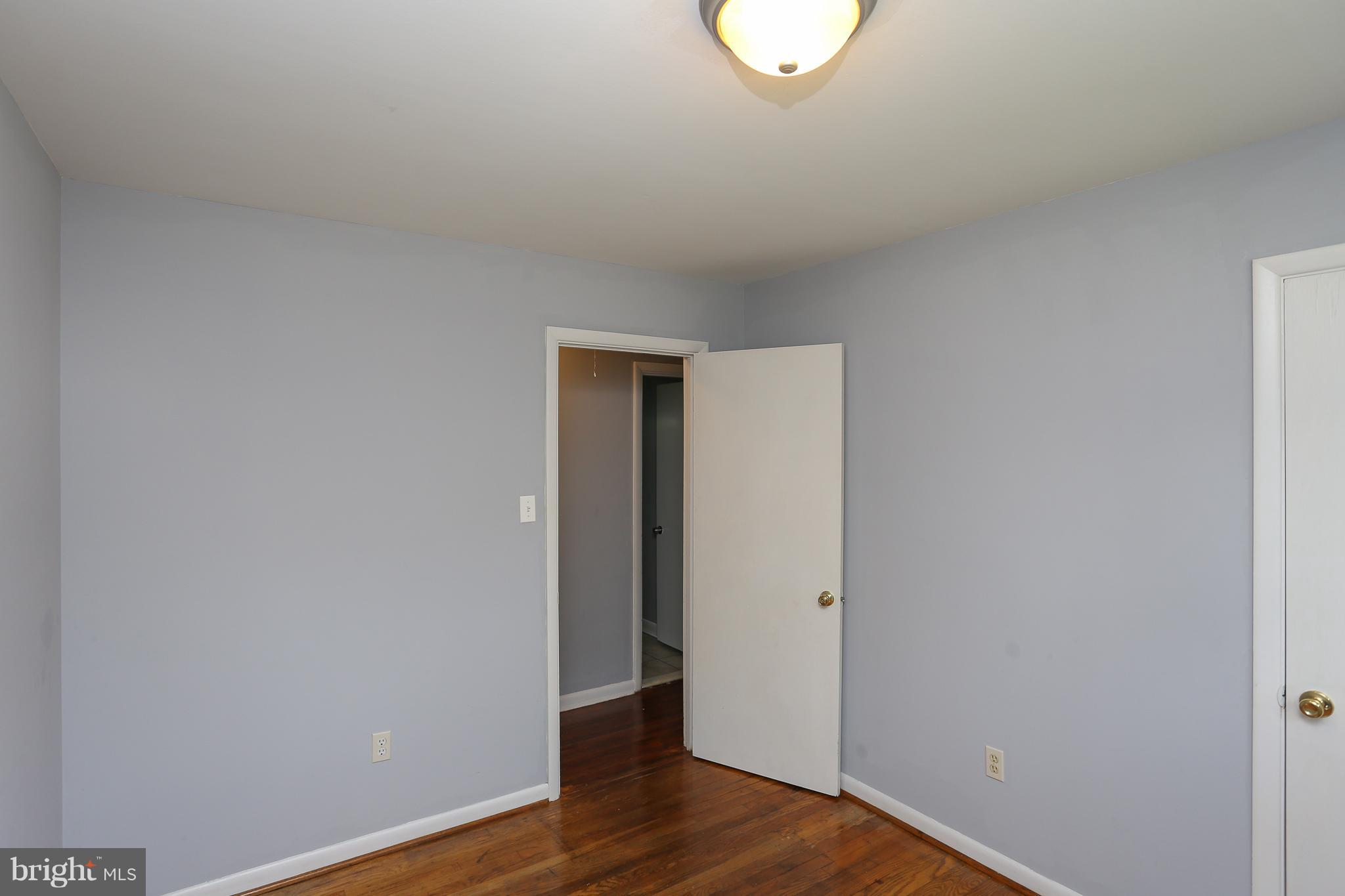 6609 Woodland Road Morningside, MD 20746 - Photo 19 of 30 a view of a livingroom with wooden floor