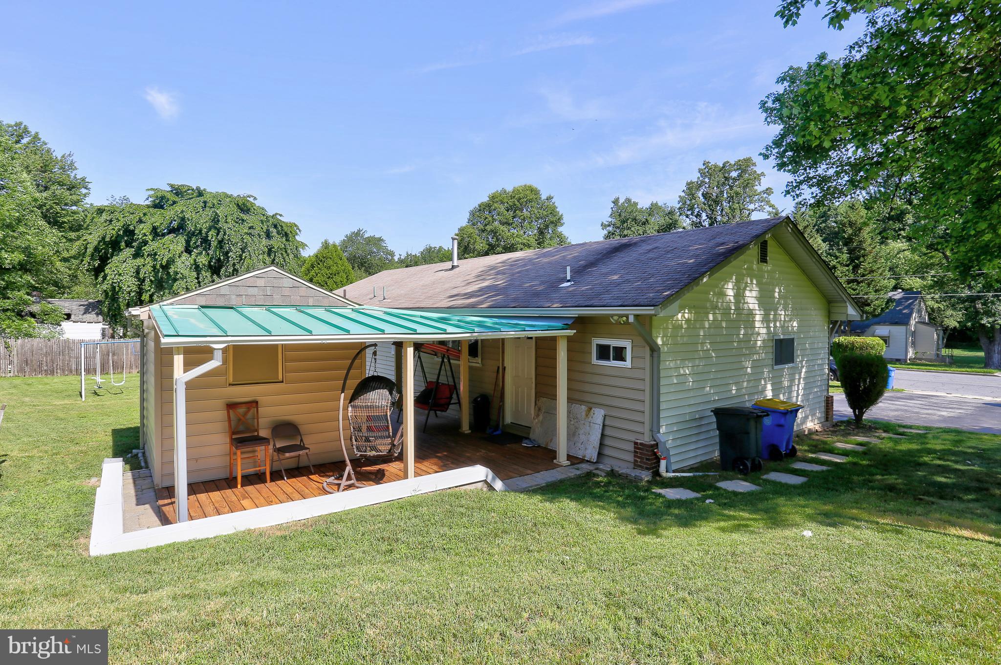 6609 Woodland Road Morningside, MD 20746 - Photo 24 of 30 a front view of a house with a yard