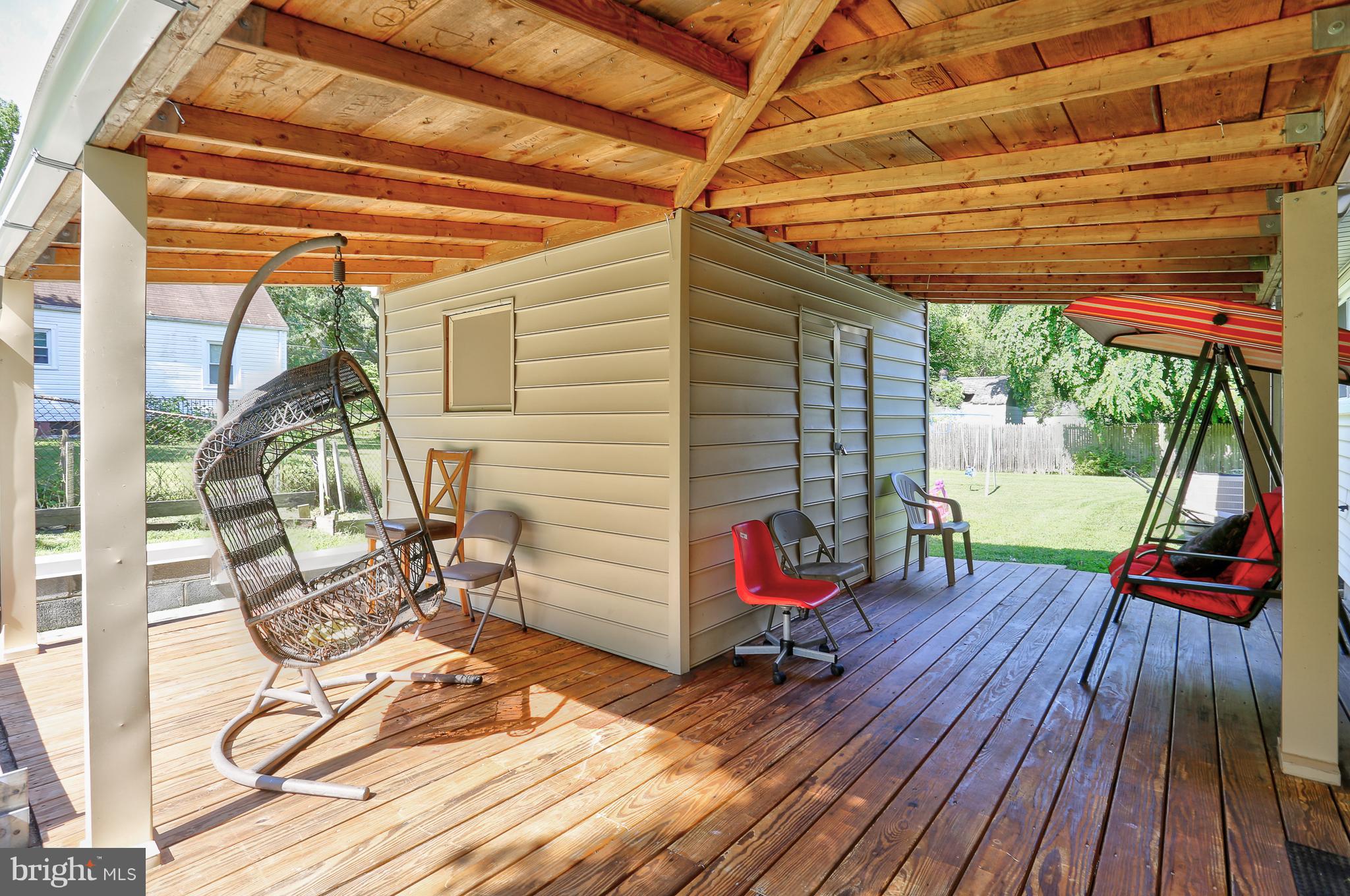 6609 Woodland Road Morningside, MD 20746 - Photo 26 of 30 a backyard view with a patio