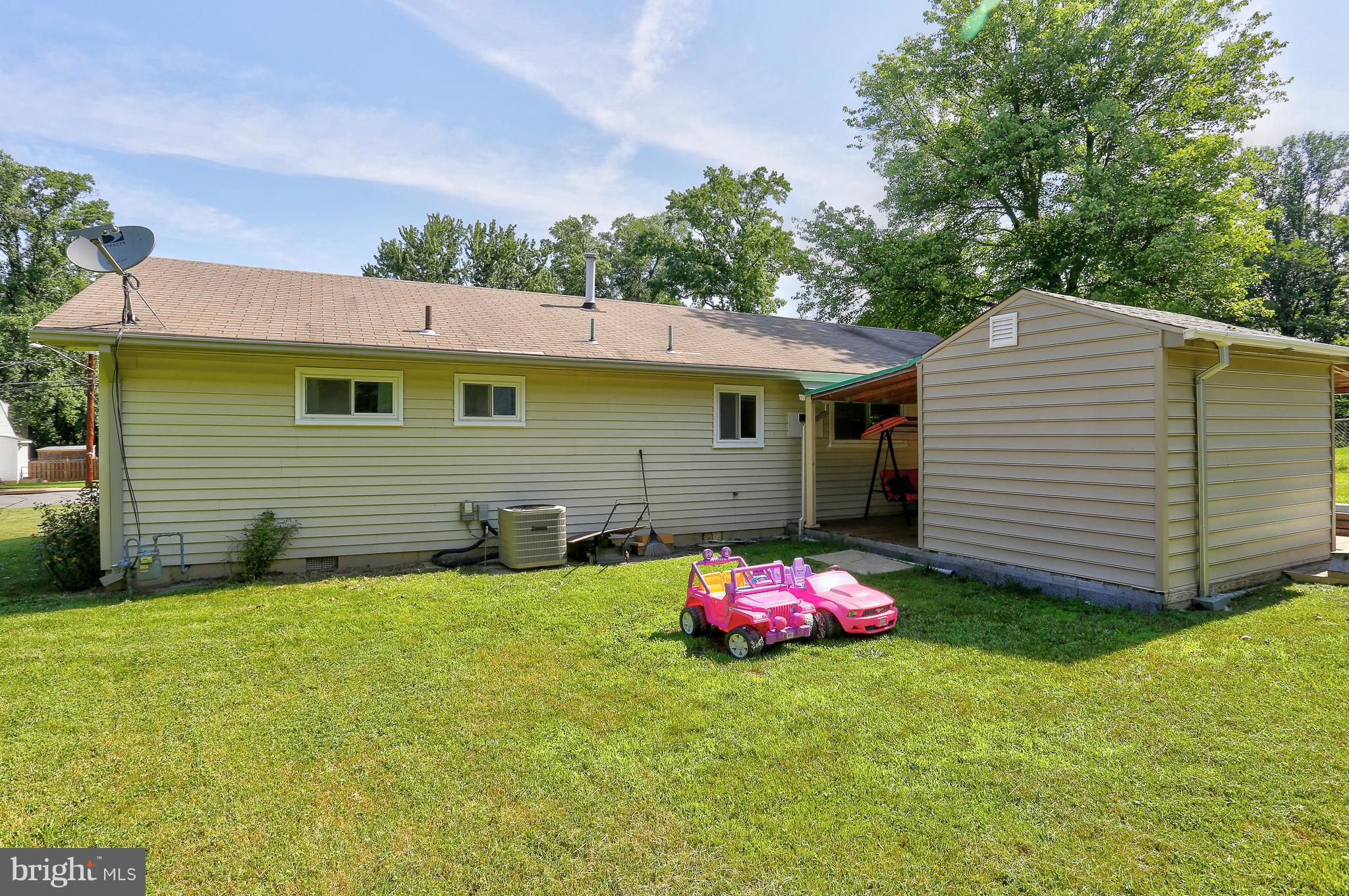 6609 Woodland Road Morningside, MD 20746 - Photo 27 of 30 a front view of a house with a yard