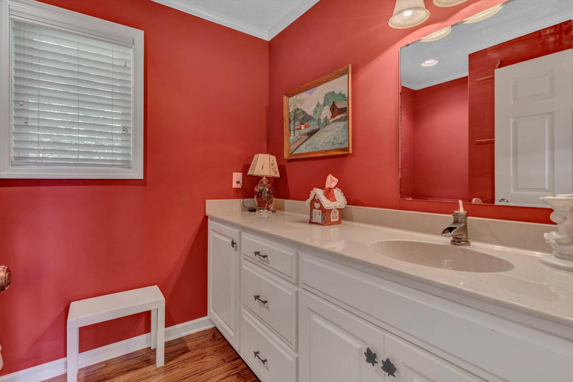 2005 Walnut Knob Road Southeast Floyd, VA 24091 - Photo 24 of 71 a bathroom with a sink and a mirror