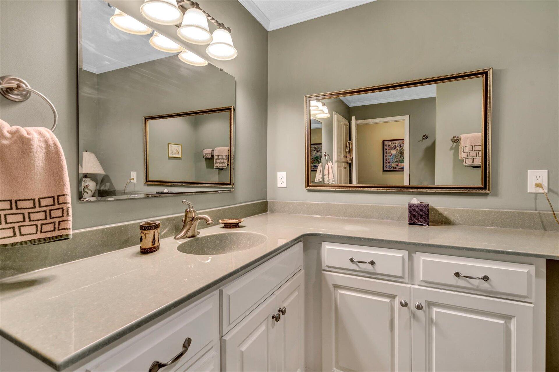 2005 Walnut Knob Road Southeast Floyd, VA 24091 - Photo 30 of 71 a bathroom with a sink and a mirror