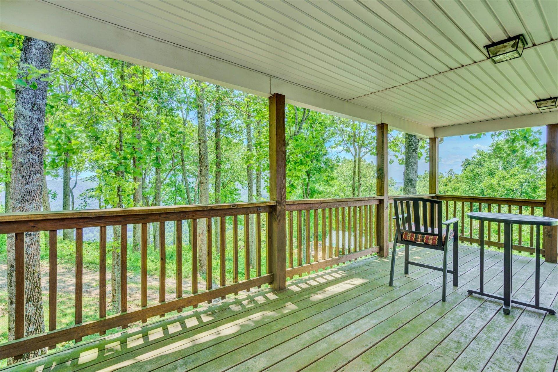 2005 Walnut Knob Road Southeast Floyd, VA 24091 - Photo 46 of 71 a view of balcony with wooden floor & fence