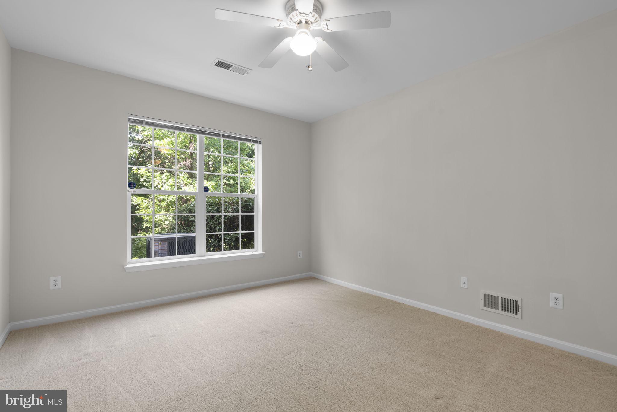 7315 Maplecrest Road, Unit 104 Elkridge, MD 21075 - Photo 39 of 58 a view of an empty room with a window
