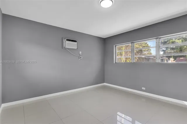 wooden floor and glass door in a room