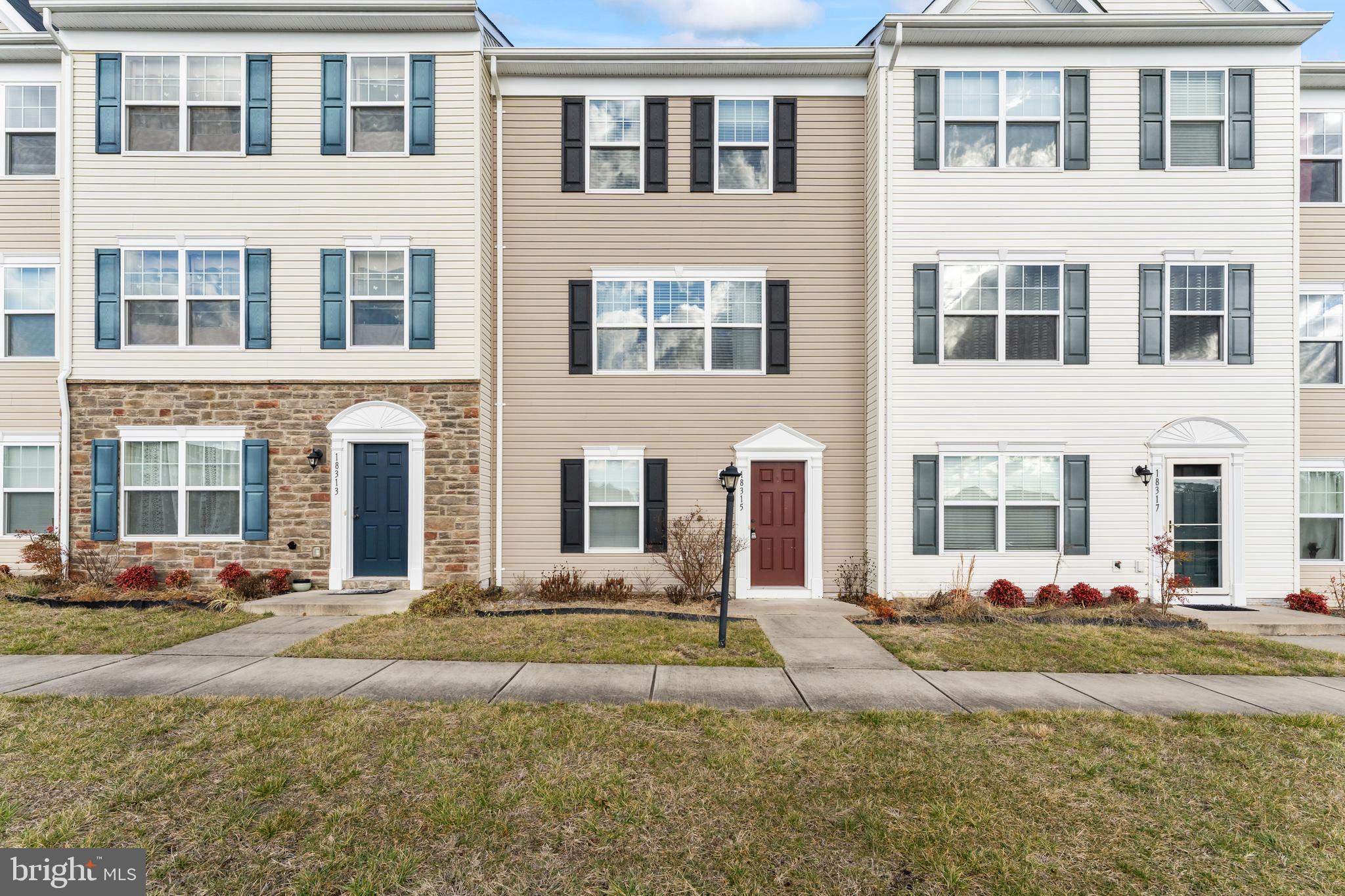a front view of a building with lot of windows