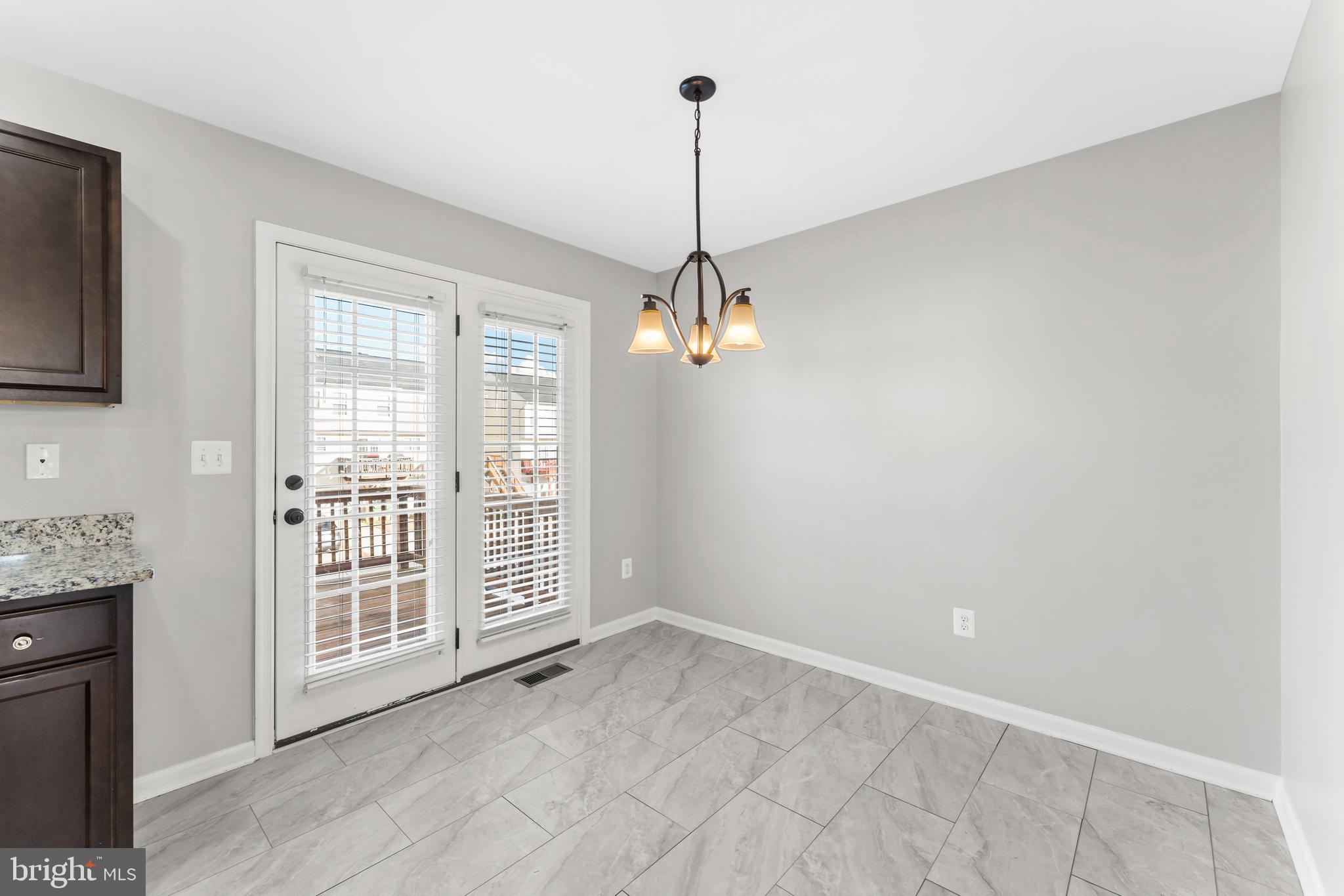 18315 Congressional Circle Ruther Glen, VA 22546 - Photo 17 of 37 a view of a room with a ceiling fan and window