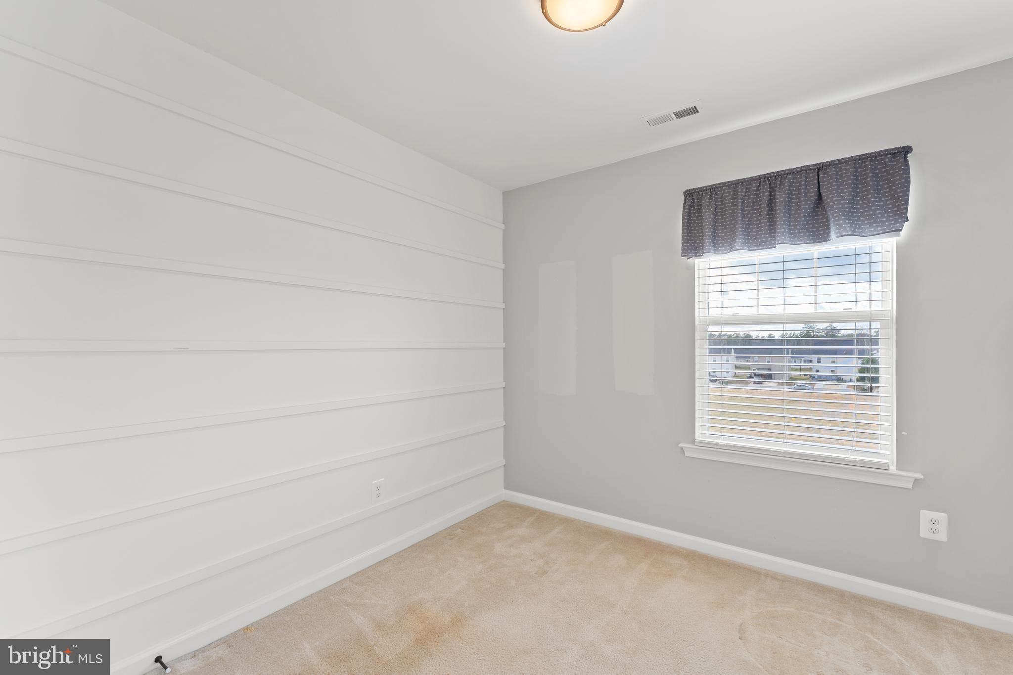 18315 Congressional Circle Ruther Glen, VA 22546 - Photo 24 of 37 a view of an empty room with a window