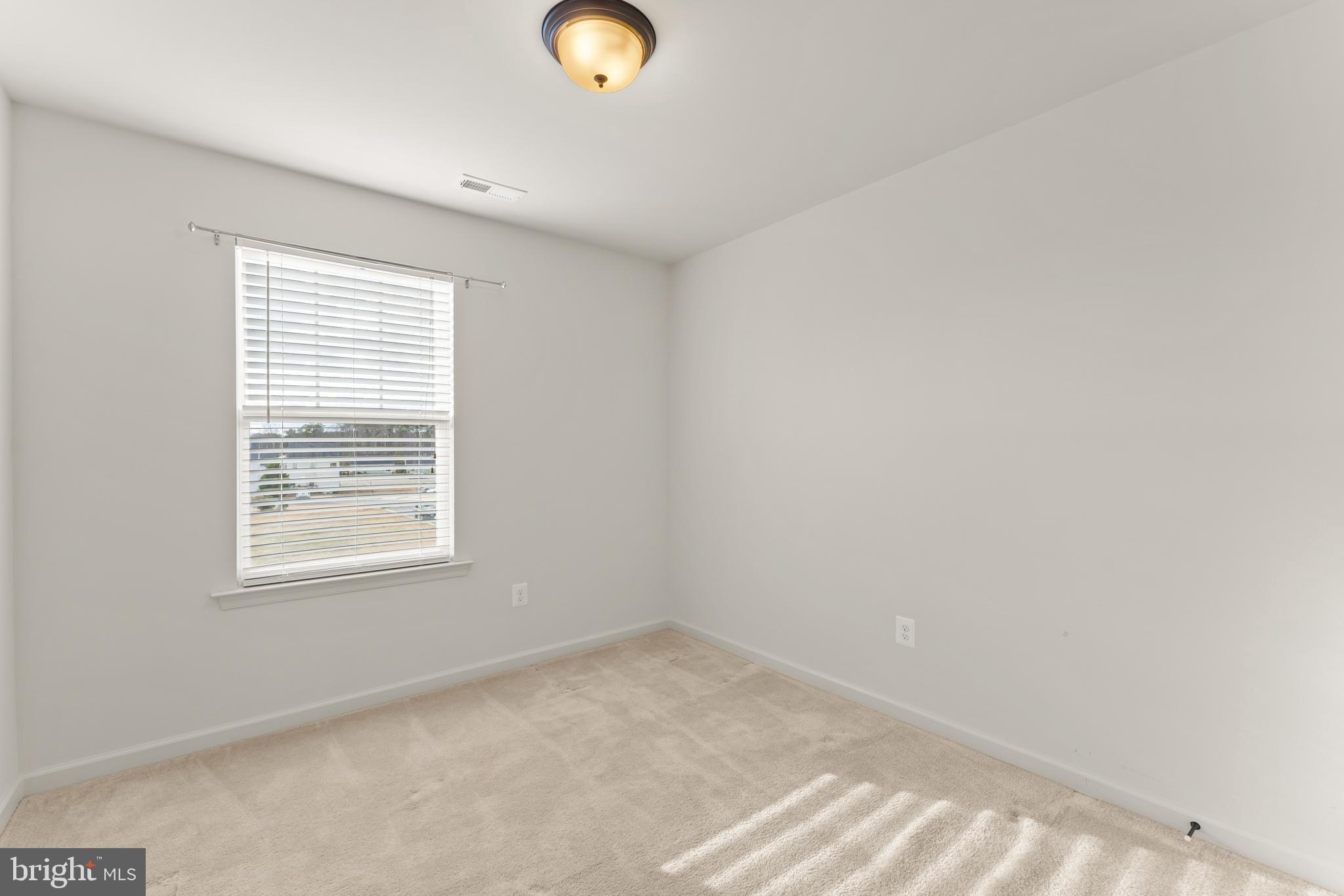 18315 Congressional Circle Ruther Glen, VA 22546 - Photo 25 of 37 an empty room with a window