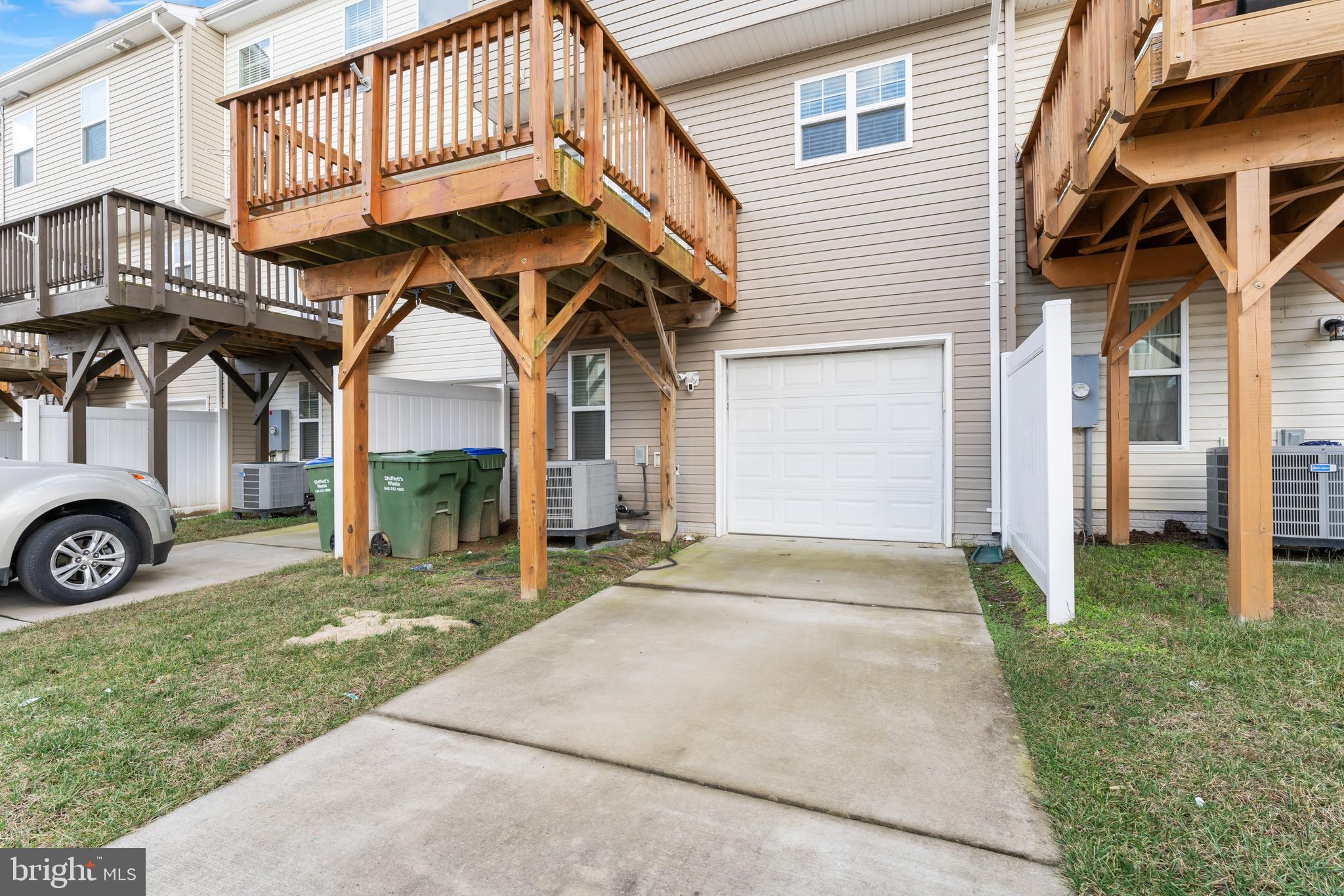 18315 Congressional Circle Ruther Glen, VA 22546 - Photo 33 of 37 a view of a house with a yard