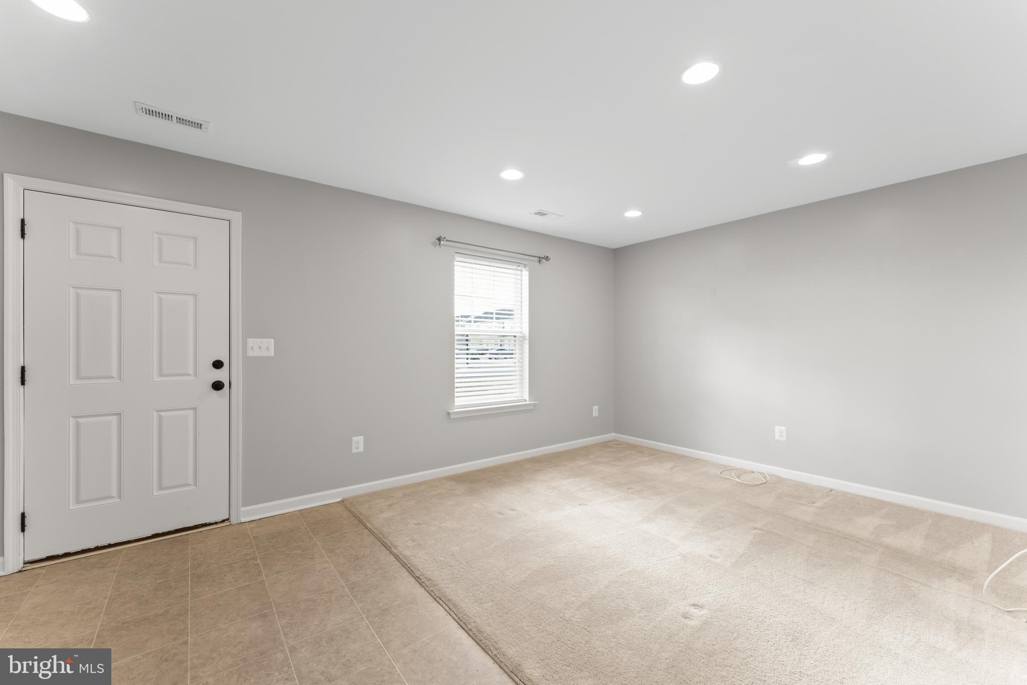18315 Congressional Circle Ruther Glen, VA 22546 - Photo 6 of 37 a view of an empty room with a window