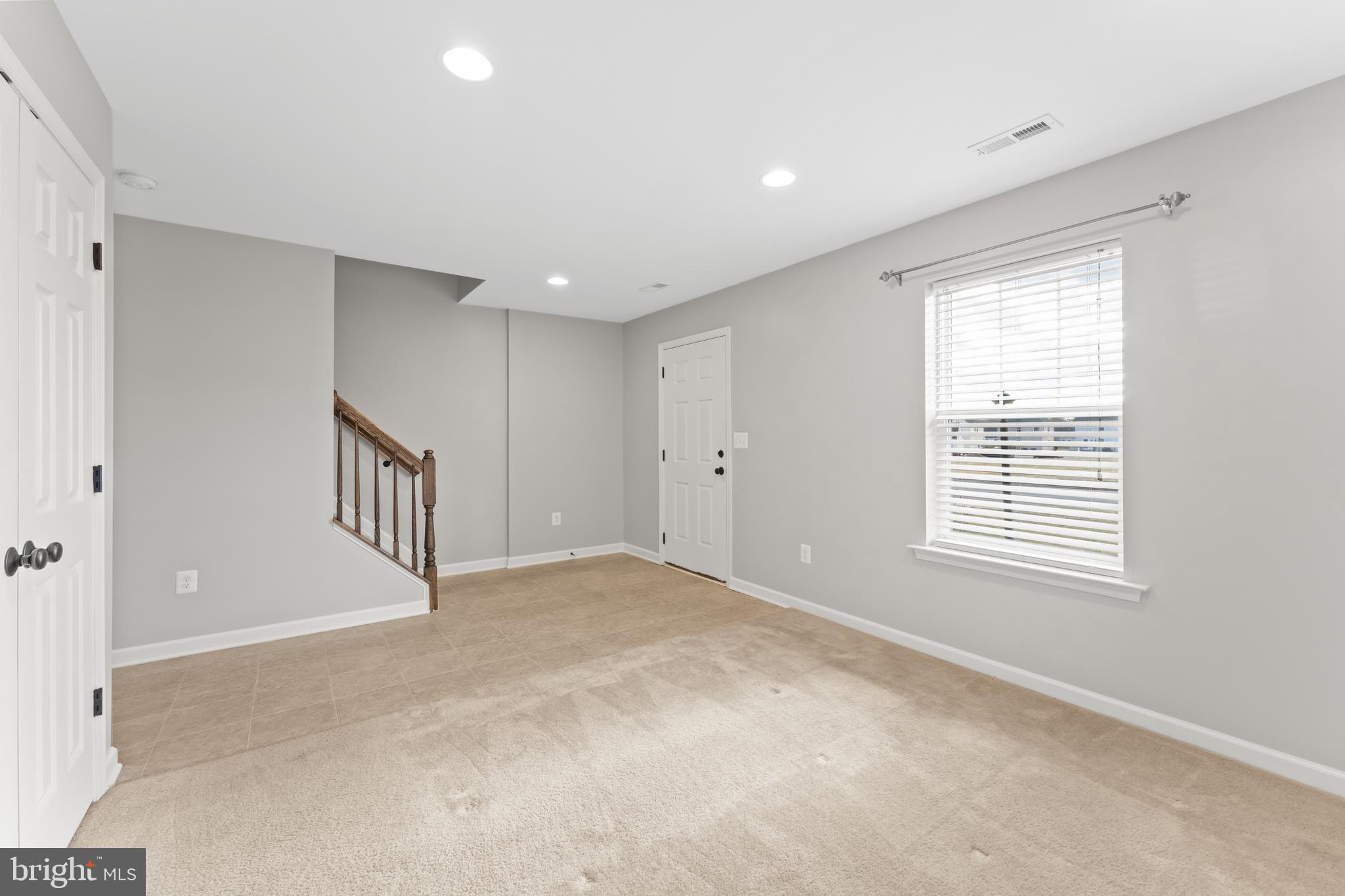 18315 Congressional Circle Ruther Glen, VA 22546 - Photo 7 of 37 a view of an empty room with a window