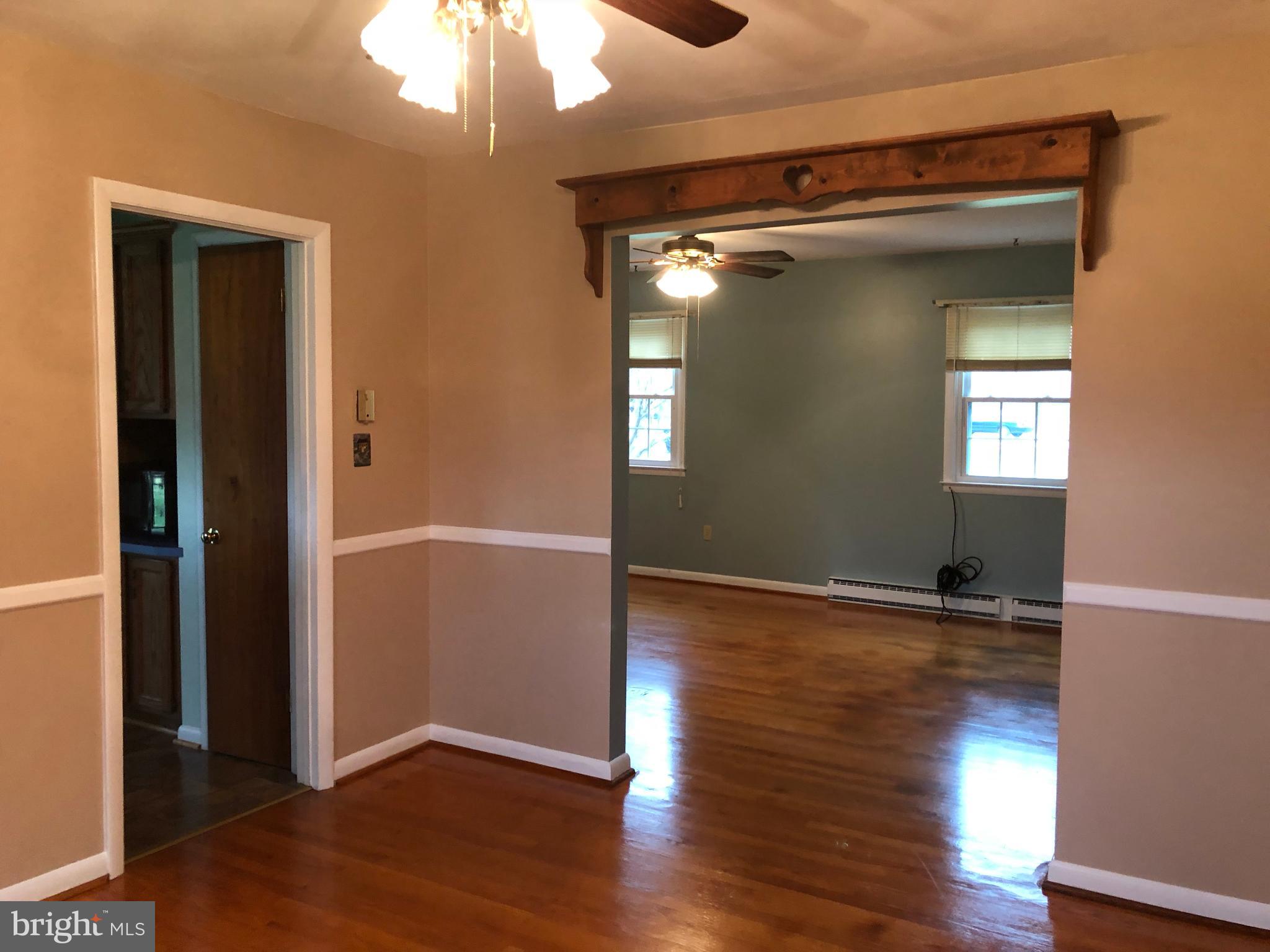 10628 Old Frederick Road Thurmont, MD 21788 - Photo 13 of 45 Formal dining room off kitchen and living room.