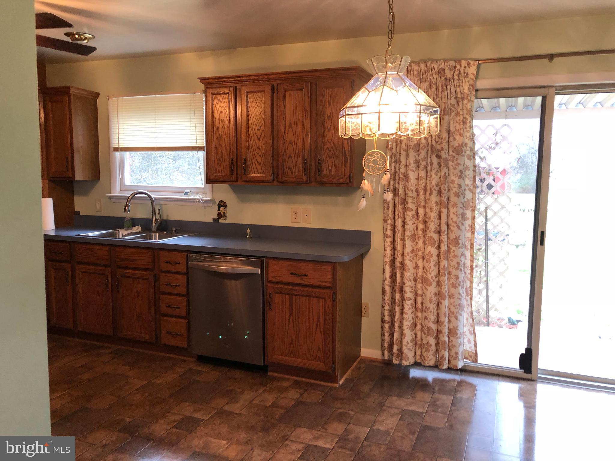 10628 Old Frederick Road Thurmont, MD 21788 - Photo 15 of 45 Sliding glass doors off dining area in kitchen
