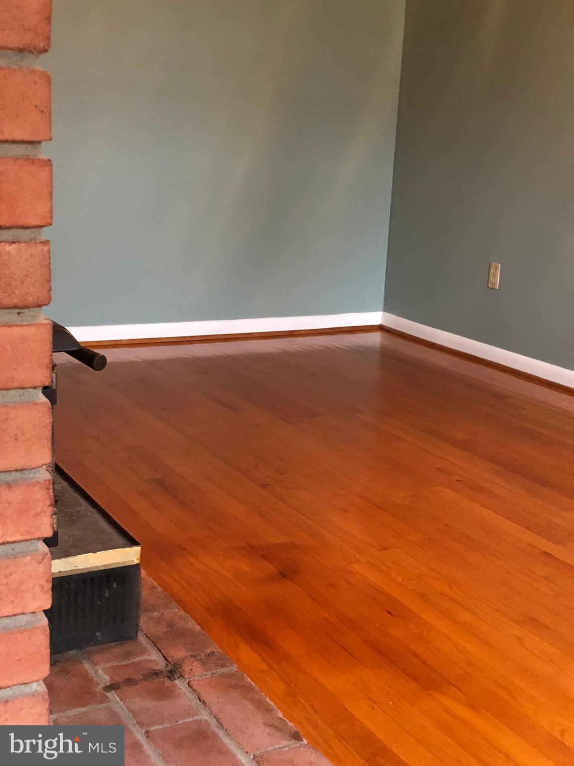 10628 Old Frederick Road Thurmont, MD 21788 - Photo 6 of 45 Large first floor family room with wood stove.