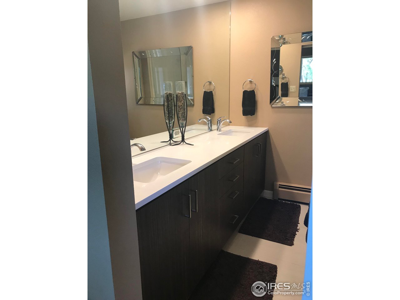 2127 14th Street Road Greeley, CO 80631 - Photo 20 of 36 Master bathroom sinks and cabinets