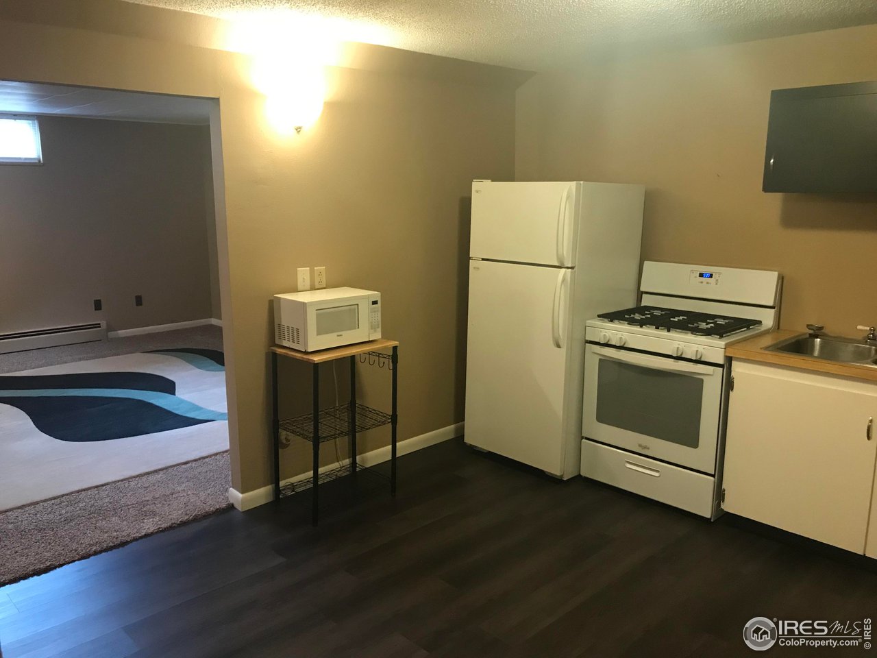 2127 14th Street Road Greeley, CO 80631 - Photo 27 of 36 Full kitchen in basement with newer appliances and disposal
