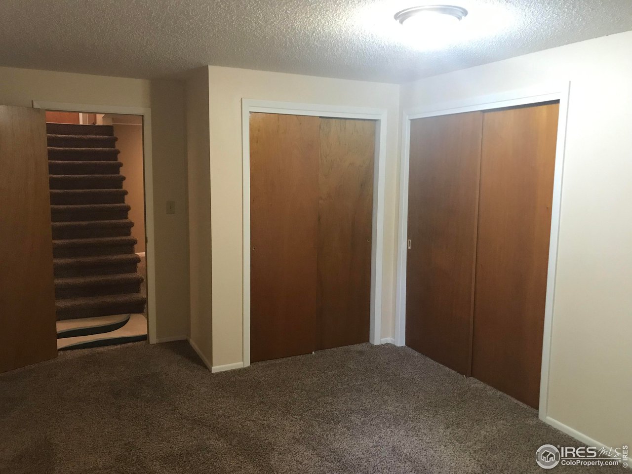 2127 14th Street Road Greeley, CO 80631 - Photo 30 of 36 4th bedroom with 2 large closets