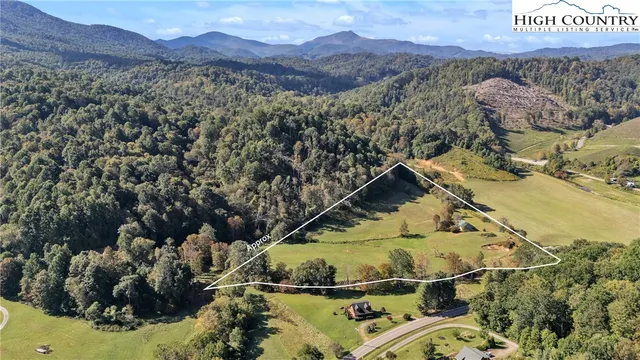 a view of a house with a mountain