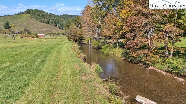 a view of a pathway with a yard