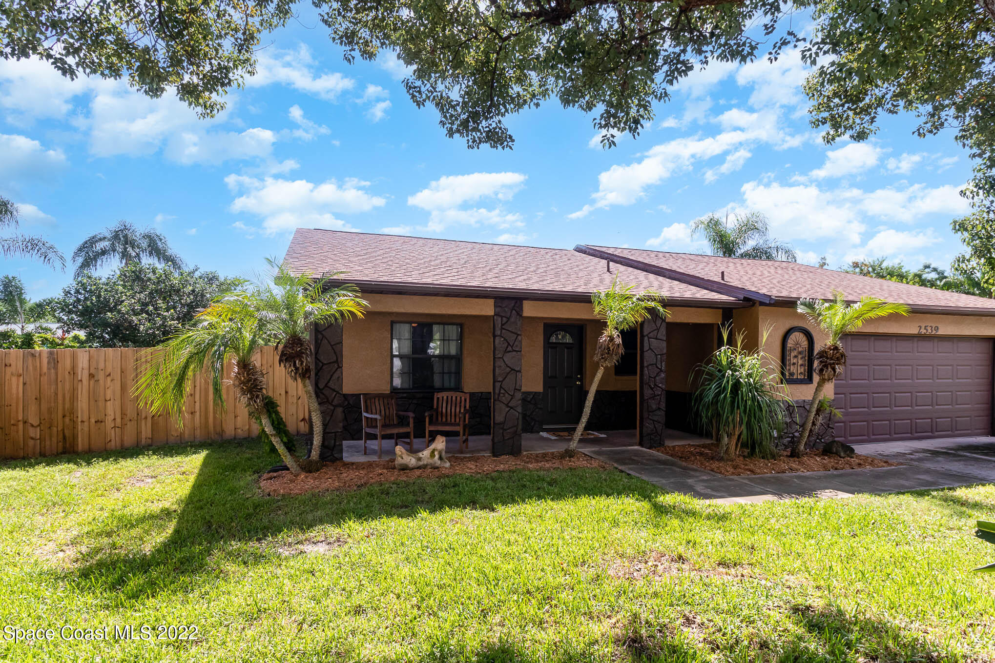 2539 Fulton Court Melbourne, FL 32935 - Photo 1 of 19 a view of a chairs in front of house