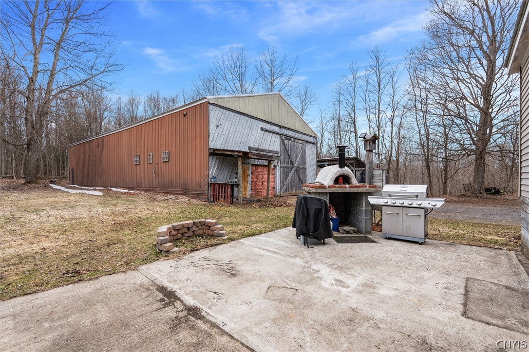 75 Ridge Road Granby, NY 13126 - Photo 40 of 50 Pole barn and outdoor pizza oven