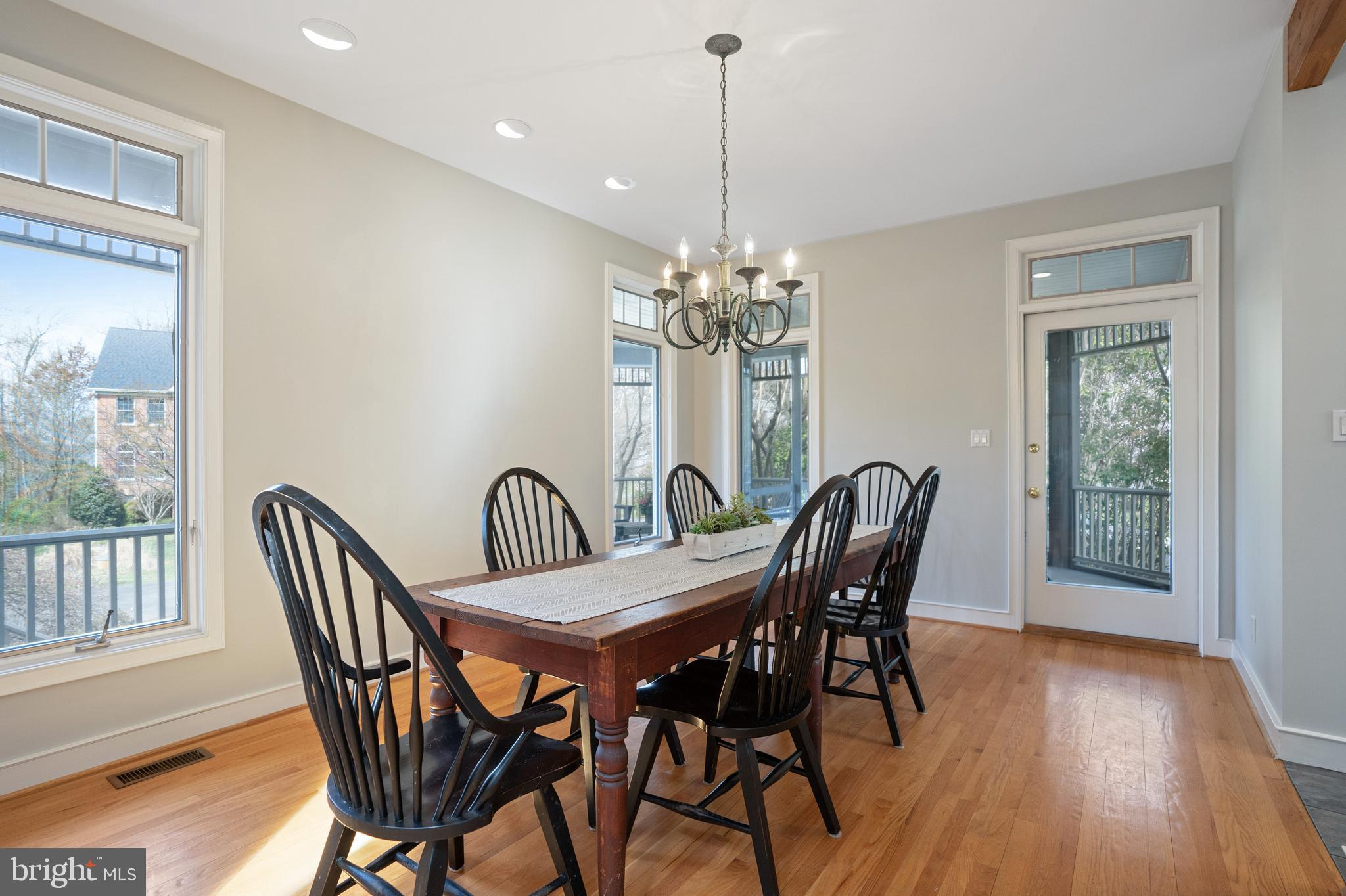 3431 Hidden River View Road Annapolis, MD 21403 - Photo 13 of 43 Spacious Dining Room Leads to Screened Porch