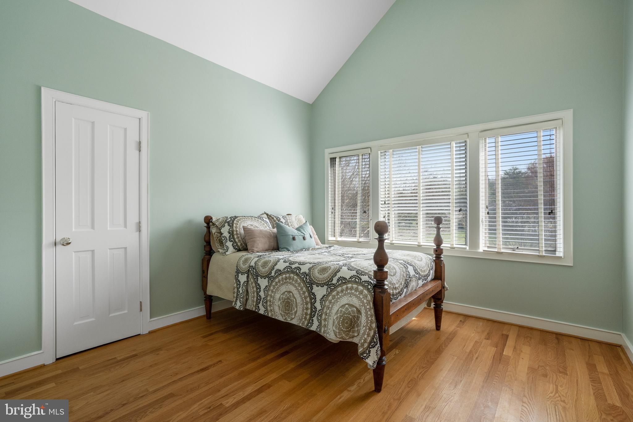 3431 Hidden River View Road Annapolis, MD 21403 - Photo 23 of 43 Serene bedroom w/vaulted ceilings & hardwoods