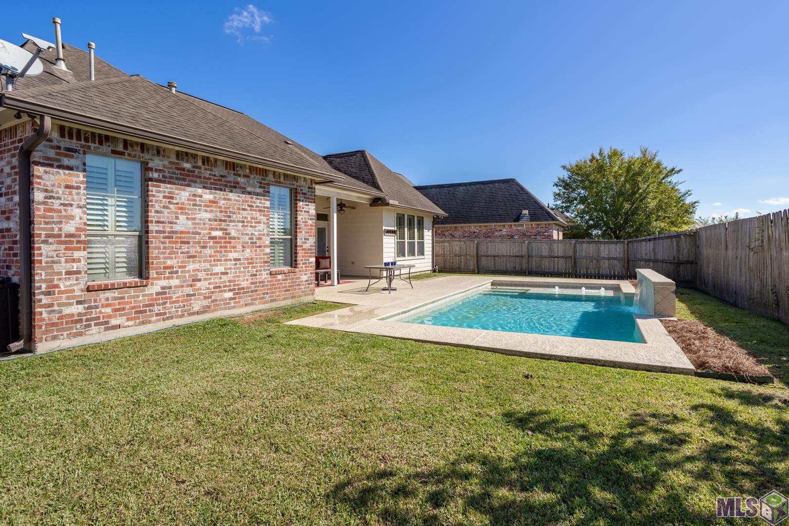 13240 Quail Grove Avenue Baton Rouge, LA 70809 - Photo 22 of 26 Nice Fenced Yard with a Beautiful Saltwater Gunite Pool