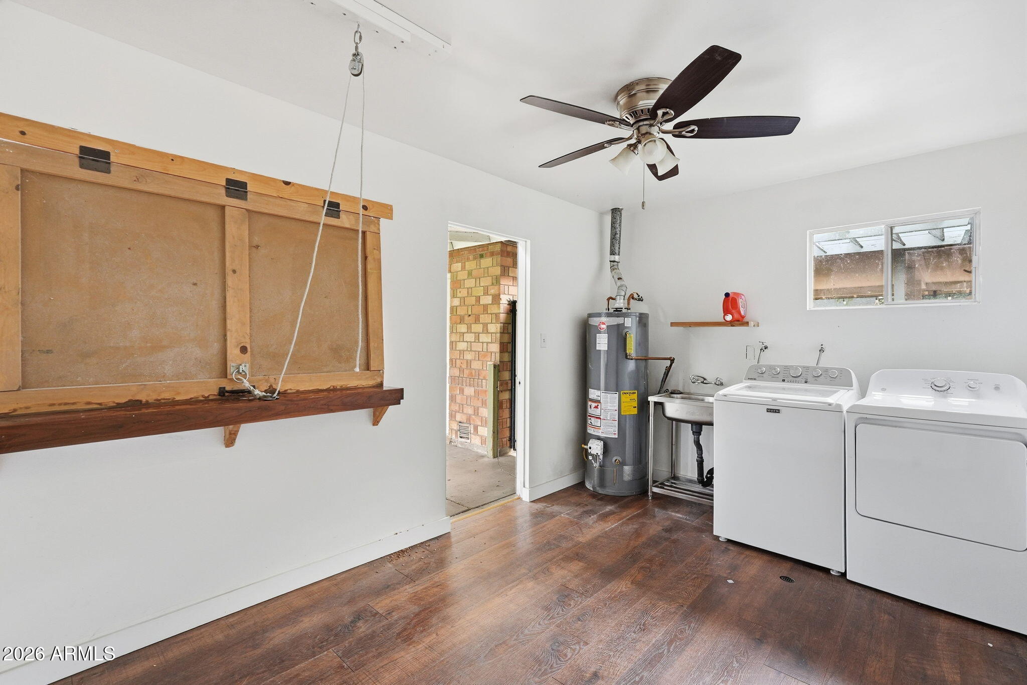 4702 North 30th Place Phoenix, AZ 85016 - Photo 28 of 34 a view of a storage & utility room with two washing machine
