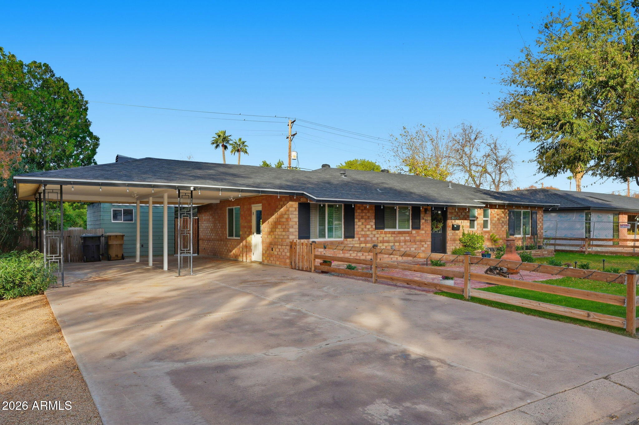 4702 North 30th Place Phoenix, AZ 85016 - Photo 3 of 34 a view of a house with a yard and sitting area