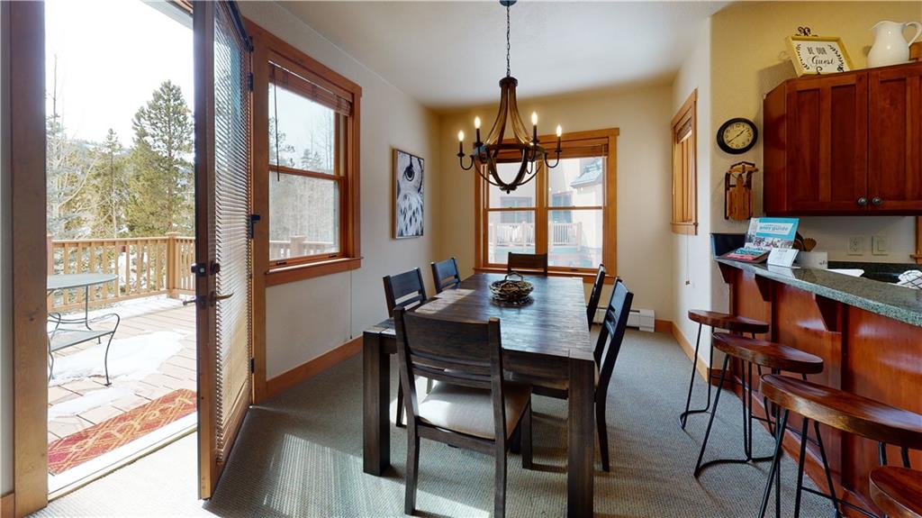 161 Hawk Circle, Unit 2336 Keystone, CO 80435 - Photo 2 of 29 a view of a dining room with furniture window and outside view