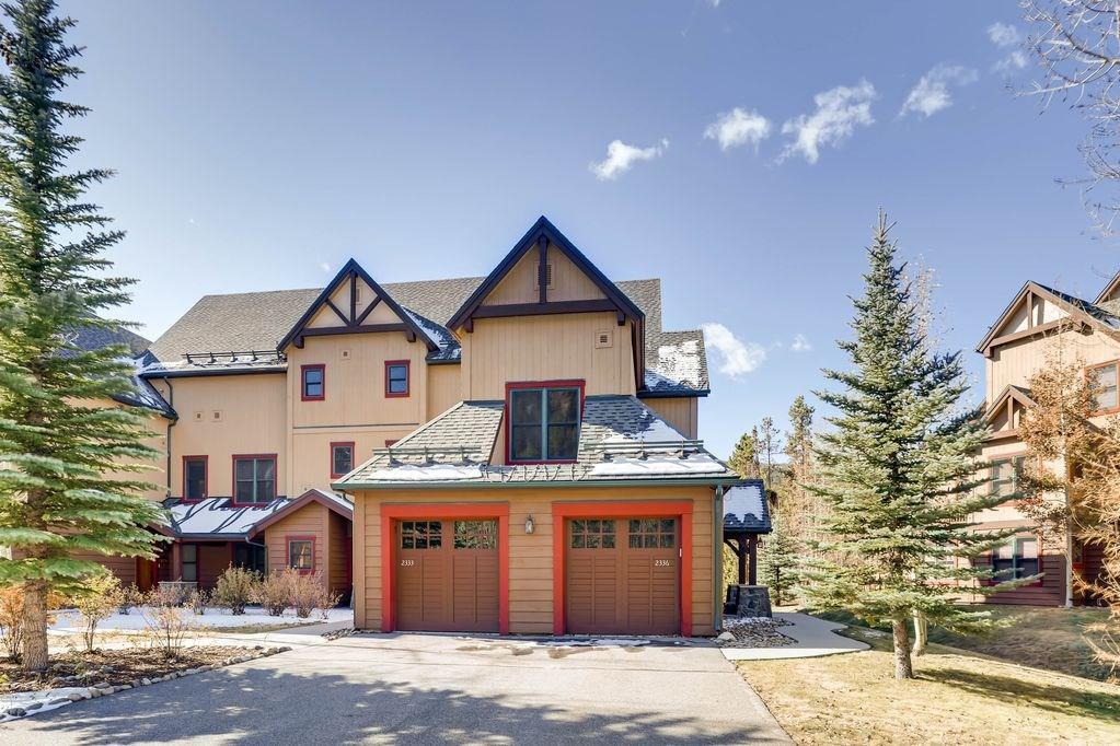 161 Hawk Circle, Unit 2336 Keystone, CO 80435 - Photo 27 of 29 a front view of a house with a yard