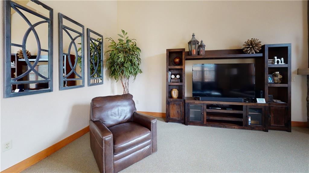 161 Hawk Circle, Unit 2336 Keystone, CO 80435 - Photo 8 of 29 a living room with furniture and a flat screen tv