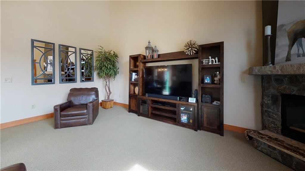 161 Hawk Circle, Unit 2336 Keystone, CO 80435 - Photo 9 of 29 a living room with furniture and a flat screen tv
