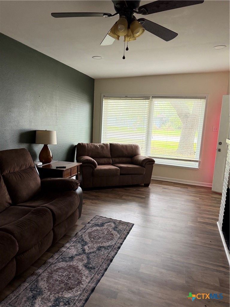 202 Bonham Street Port Lavaca, TX 77979 - Photo 11 of 11 a living room with furniture and a large window