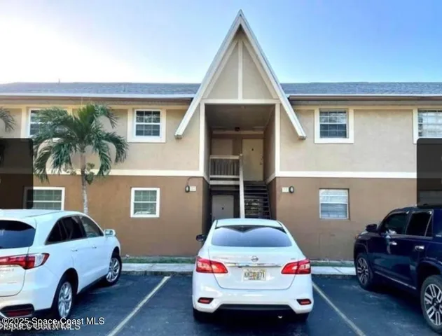 a car parked in front of a house