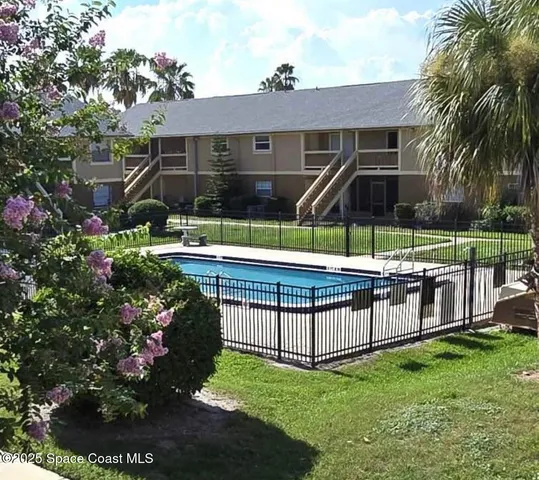 a garden view with a seating space