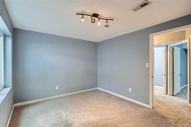 a view of a room with a window